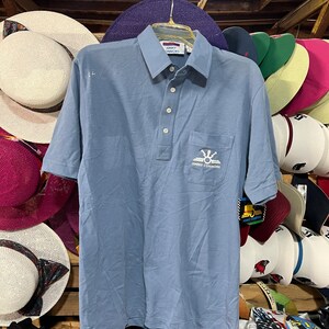 Vintage Jimmy Conors Polo Shirt. Purple Size S. New with tags old stock. Official Manufacturer Sewn in Jimmy Connors Tennis Legend label