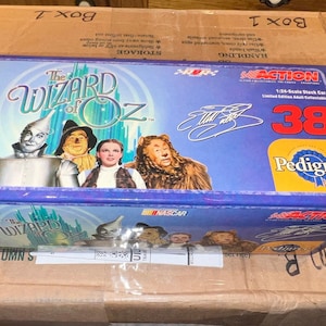 Wizard of Oz 2004 Action Elliott Sadler #38. Pedigree Wizard of Oz. 1:24 Scale Car new in original box unused.