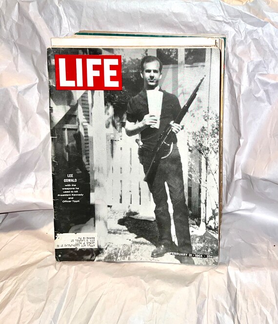 Life Magazine Feb 1964. Lee Oswald With the Weapons He Used to
