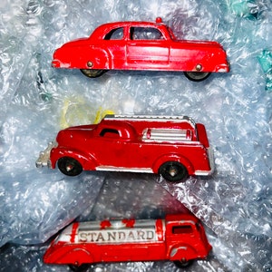 Vintage Metal Fire Trucks. Tootsietoy Classic &quot;Standard&quot; Fire Engine, Tootsietoy Fire Chief Car with light on top and Minol Fire Engine USA