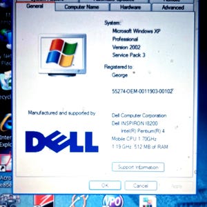 May include: A computer screen displaying the Microsoft Windows XP Professional System Properties window. The text shows Version 2002 Service Pack 3, registered to George, with Dell Inspiron 18200, Intel Pentium 4 1.70GHz CPU, and 512 MB of RAM.