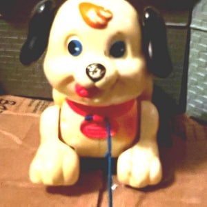 Puppy Dog Pull Toy "Lil Snoopy" by Fisher Price. Vintage 1970’s Pull Toy. Watch him react when you walk the dog!