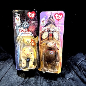 McDonald&#39;s Happy Meal “Brittania the Bear&quot; Born Dec 25, 1997. Glory the Bear&quot; Born July 4, 1997. Ronlad McDonald House Charities 1999.