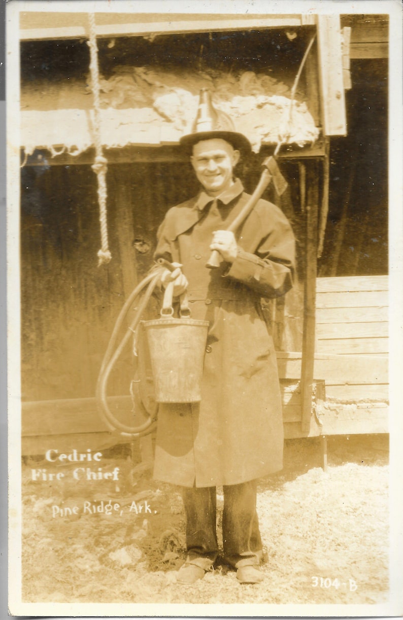 Vintage RPPC Cedric Fire Chief Pine Ridge Arkansas 1930/'s Real Photo Postcard Fireman Uniform Axe Hat Kodak box Black and White Photo.