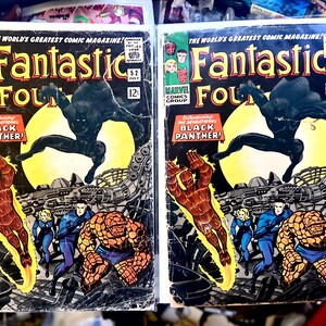 May include: Two vintage comic books, "Fantastic Four" issue 52, featuring the Black Panther. The covers display vibrant illustrations of the Fantastic Four team, a leaping Black Panther, and the text "The World's Greatest Comic Magazine!"