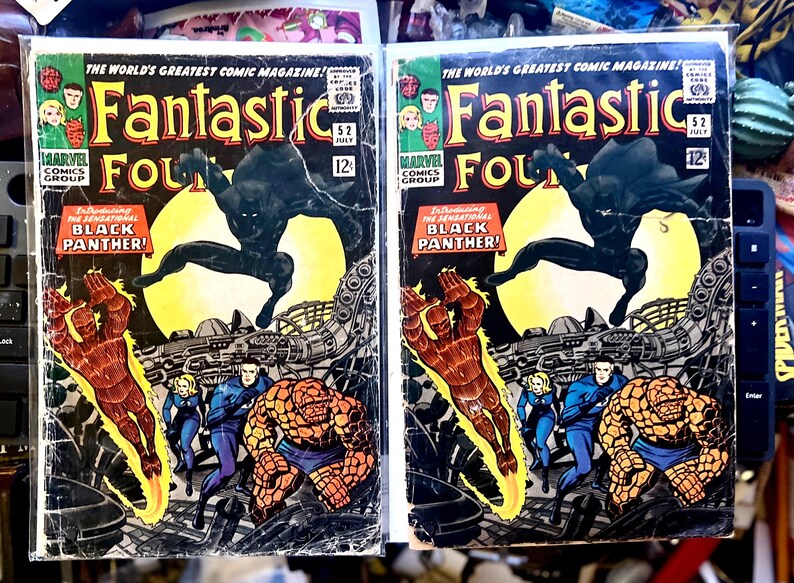 May include: Two vintage comic books, "Fantastic Four" issue 52, featuring the Black Panther. The covers display vibrant illustrations of the Fantastic Four team, a leaping Black Panther, and the text "The World's Greatest Comic Magazine!"