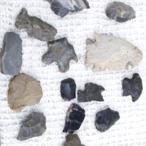 Arrowheads and Arrowheads Pieces Vintage Native American Artifacts in various shapes and sizes.