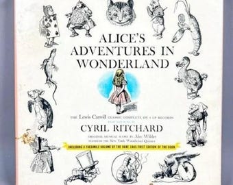 Alice in Wonderland Boxed Set 1957 w 1865 Original Book facsimile Alice’s Adventures in Wonderland and read aloud on a 4 Vinyl record set.