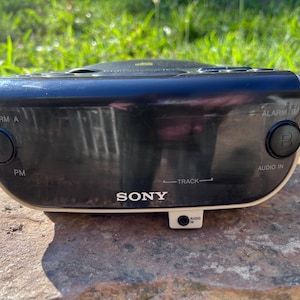 This Sony Dream Machine clock radio.  Wonderful vintage 1990s addition to any home decor. With its sleek design and easy-to-read display