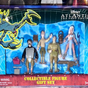 May include: A collectible figure gift set featuring characters from Disney's Atlantis: The Lost Empire. The set includes five figures, a weapon, and a lantern, all packaged in a blue and red box. The box has the text "COLLECTIBLE FIGURE GIFT SET".