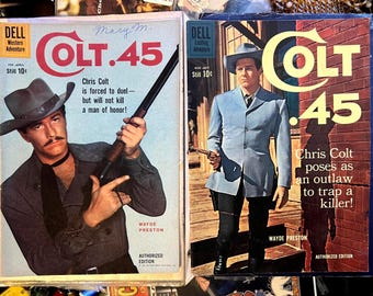 May include: Two vintage comic book covers featuring a man with a gun. The covers are titled "Colt .45" and feature the text "Chris Colt" and "Authorized Edition".