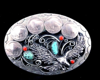 Vintage Native American Handmade Belt Buckle with Eagle in Flight Decorated w Turquoise, Red Coral  w 5 Buffalo Nickel images. Signed T-Bird