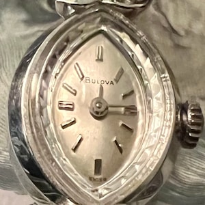Ladies Bulova Diamond and gold Wristwatch Combines Function & Elegance in this Classic Timeless Jewelry Traditional Winding Vintage Watch
