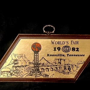 Worlds Fair Knoxville Tennessee - 1982 wall plaque shaped like the state of Tennessee Official 1982  Worlds Fair Knoxville Tennesse Souvenir