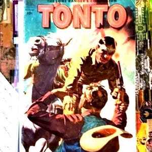 以下が含まれることがあります： 「The Lone Ranger's Companion TONTO」というタイトルのヴィンテージコミックブック。馬に乗った人物と銃器を手にした人物のカラフルなイラストが描かれており、表紙の左上隅には10セントの価格表示が確認できます。