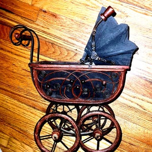 Vintage Antique Styled Baby Doll Carriage / Doll Stroller. Working wooden wheels. Top goes up and down Excellent display, play or photo prop