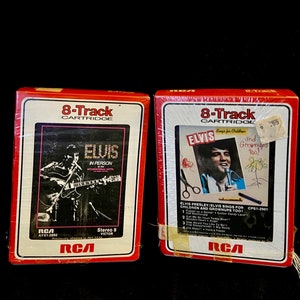 May include: Two 8-track cassette tapes featuring Elvis Presley. The first tape is titled "Elvis in Person" and the second tape is titled "Elvis Sings for Children and Grownups Too!" Both tapes are in their original packaging.