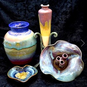 Pottery Collection. Four great pieces. Tall amphora-style bud vase has a chip at top but would cover well with flowers