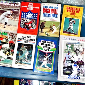 Vintage Collection 1972 MLB and NFL Record Books. 1973 Baseball Records 75,76,77,79 All Pro Baseball Stars & 2000 Chicago Cubs Info Guide.