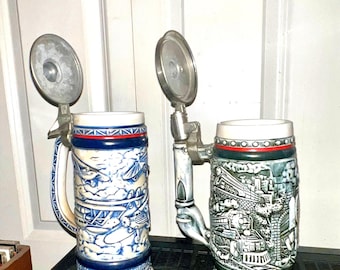 Airplanes and Trains Beer Steins.  Vintage Beer Mugs 1981 and 1982 Handcrafted in Brazil exclusively for Avon. Numbered on the bottom.