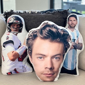 Pillow with face cheap printed on it
