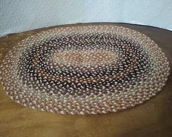 Handmade dollhouse oval braided rug