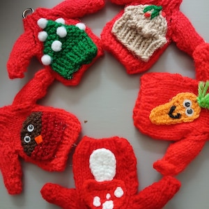 Hand knitted Christmas jumpers on a wooden hanger in different designs , great for a gift or Christmas decoration , comes gift wrapped
