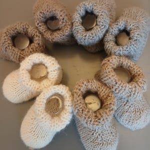 Alpaca luxury gender neutral baby booties hand knitted in alpaca. comes gift wrapped so soft and cosy and warm the perfect newborn gift .