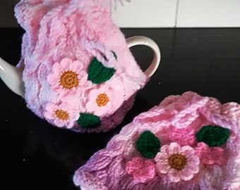 Tea cozy Hand knitted  Cable tea cozy with hand crochet flowers and leaves  fits a large 5-cup teapot gift or a treat for yourself .