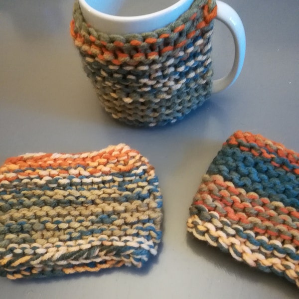 Extra chunky mug cosy , hand knitted in garter stitch , Random multi coloured cosy that really does keep your drinkers hot , lovely to hold