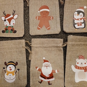 lots of choices ,Hessian Christmas gift bags , little hessian gift bags ideal for sweets and little gifts  and parties. lots of designs .