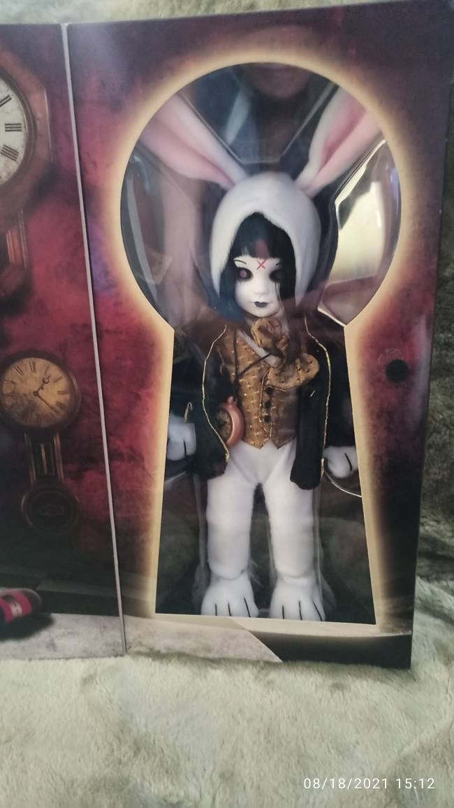Living Dead Dolls Are Here Eggzorcist Alice in Wonderland the