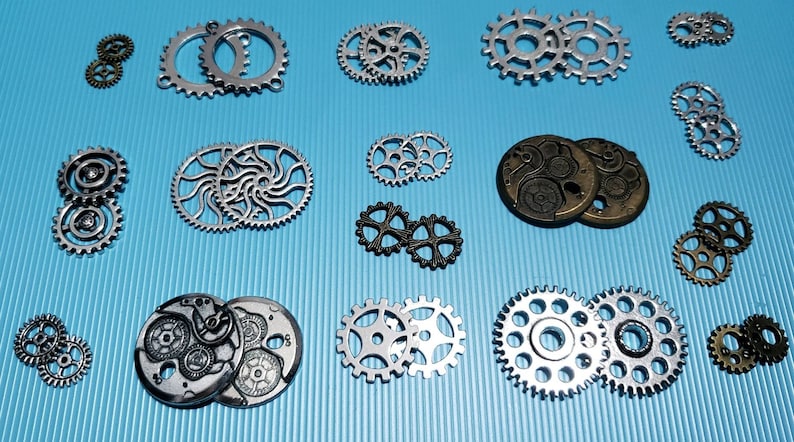 Mixed lot of 34 Steampunk Gear Charms 4 Lots