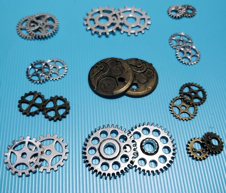 Mixed lot of 34 Steampunk Gear Charms 4 Lots