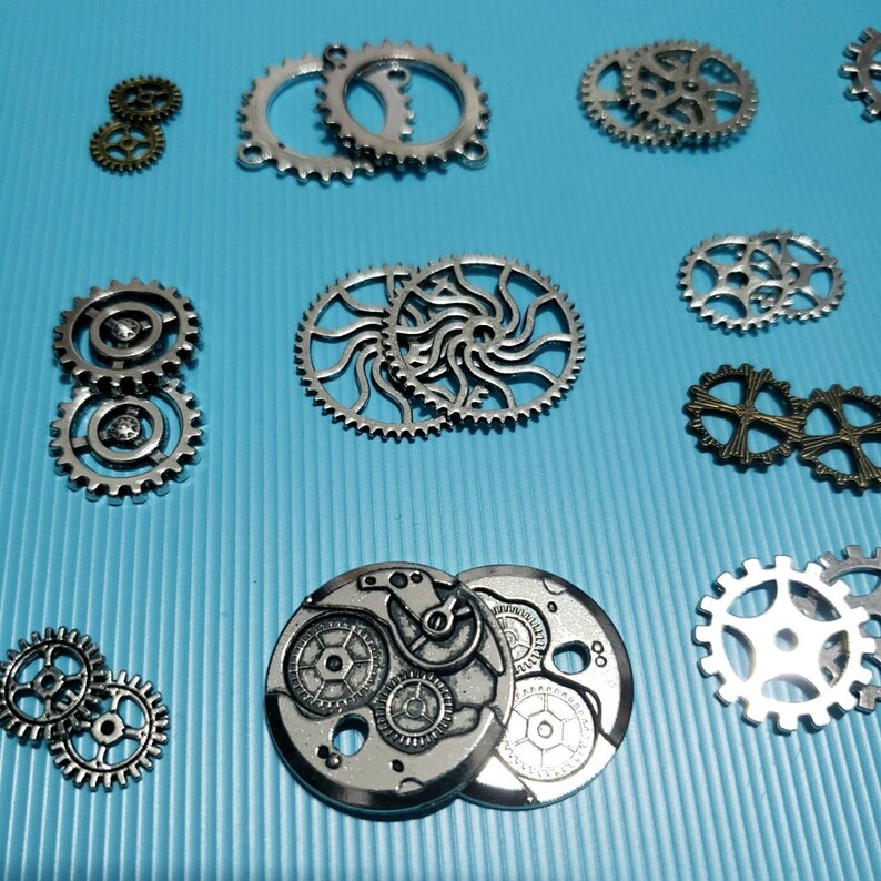 Mixed lot of 34 Steampunk Gear Charms 4 Lots