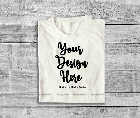 Download White Folded T Shirt Mock Up Top View Shirt Flat Free Download Psd Mockup Packaging