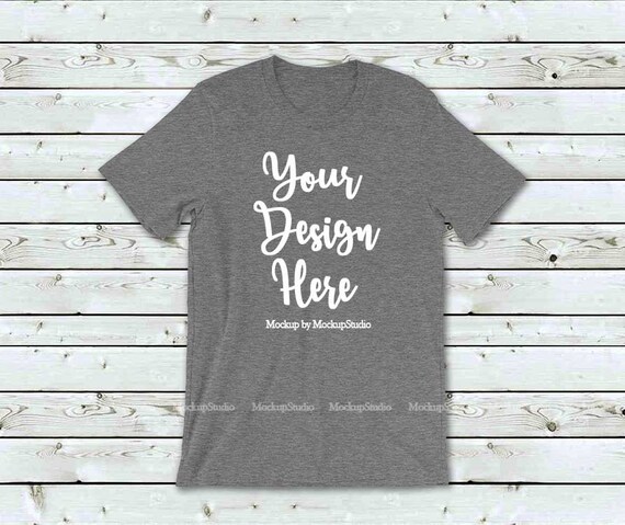 Download Free Deep Heather Grey T Shirt Mock Up Wood Background Bella Psd Psd Mockup Design Collection Psd Mockup Design For Logo Download