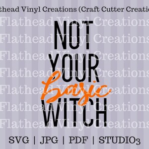 May include: Black and orange graphic design with the text "NOT YOUR BASIC WITCH".