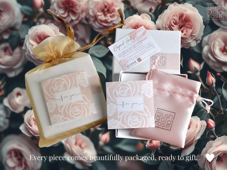 May include: Gift packaging with a floral background. The image shows a gold mesh bag, a pink satin pouch, and white boxes, all containing items. Cards with the text "for you" and "Beyond Grateful" are also visible. The brand name "Blush Gold Rose" is displayed.