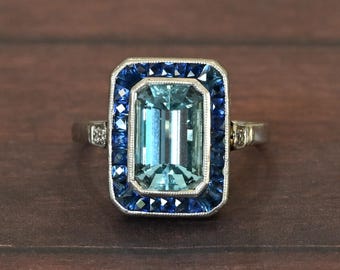 Art Deco Platinum Emerald Cut Aqua With Sapphire Halo Ring