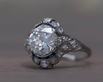 Circa 1910's Edwardian Platinum 2.34ct Old European Cut Diamond & Sapphire Ring
