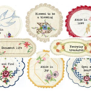 May include: A selection of embroidered patches with diverse designs and text. The patches showcase floral patterns, birds, and phrases such as "Abide in peace," "Blessed to be a blessing," and "Everyday treasures." The colour scheme includes white, red, blue, and yellow.