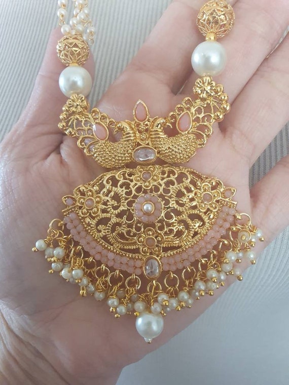 Gold shop kundan lockets