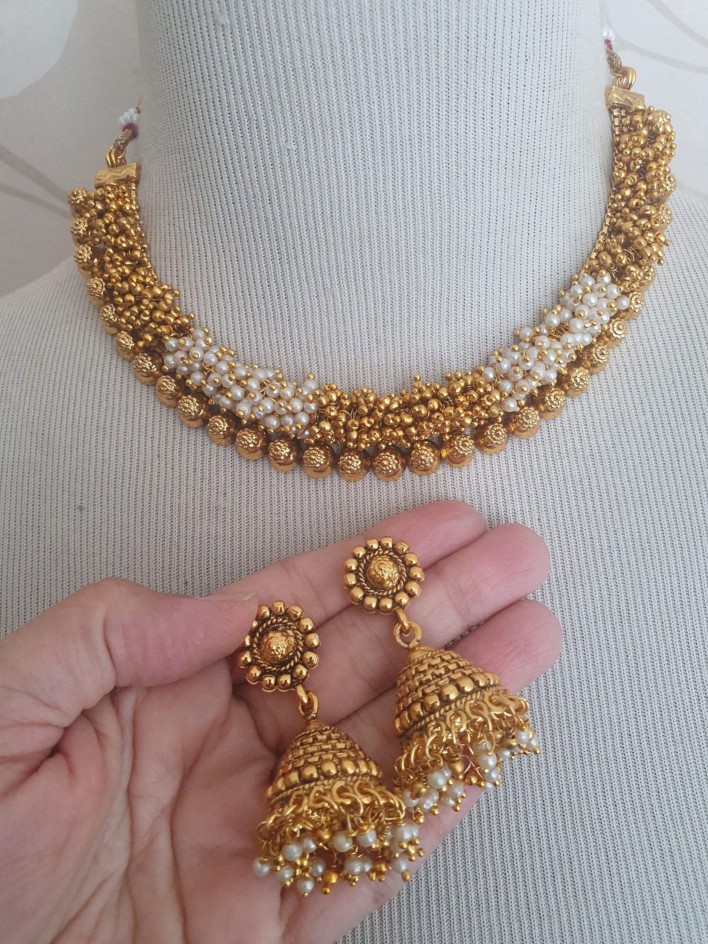 Gold necklace with jhumka best sale set