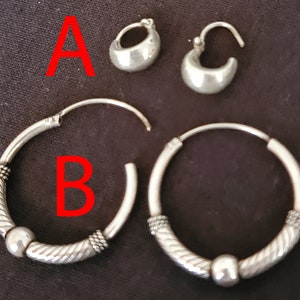 Silver coloured earrings