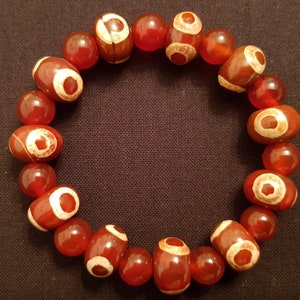 Tibetan 3 eye dZi bead stretch bracelet