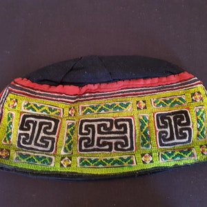 Vintage Chinese tribal ethnic minority cap with hand woven hand embroidered panel