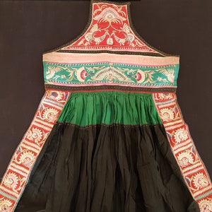 Old handmade Chinese tribal Miao pinafore apron with embroidered silk panels from Guizhou Province, SW China