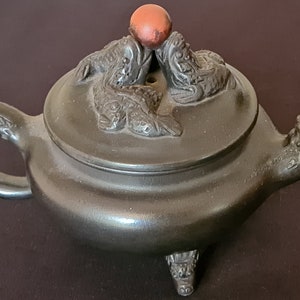 Vintage beautiful Chinese earthenware dragon teapot.