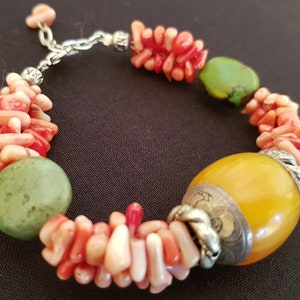 Tribal bracelet with large beeswax stone, turquoise and coral from Lijiang, SW China